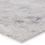 Textured rug with a neutral color palette on a white background