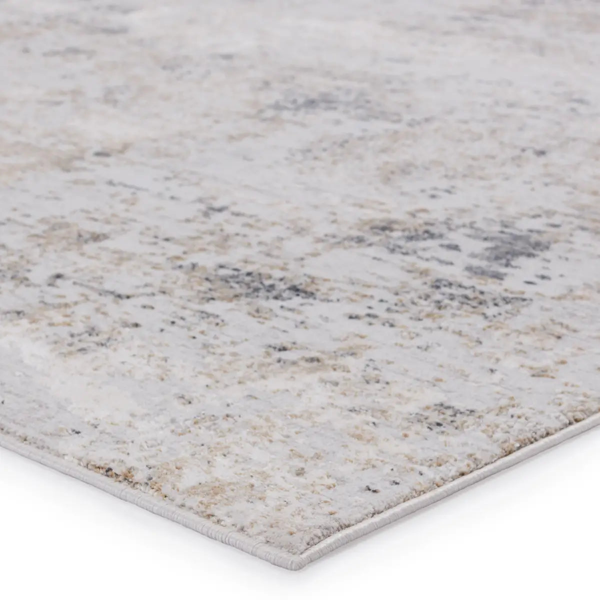 Textured rug with a neutral color palette on a white background