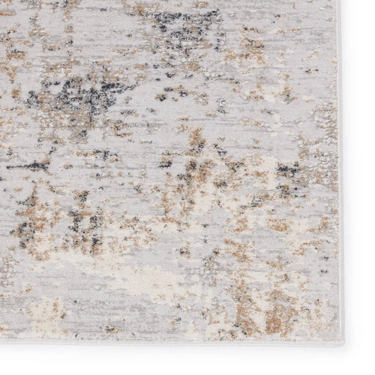 Textured area rug with a neutral color palette on a white background