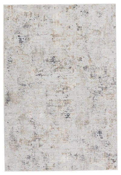 Textured area rug with a neutral color palette on a white background
