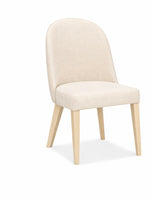 Beige upholstered chair with wooden legs on a white background