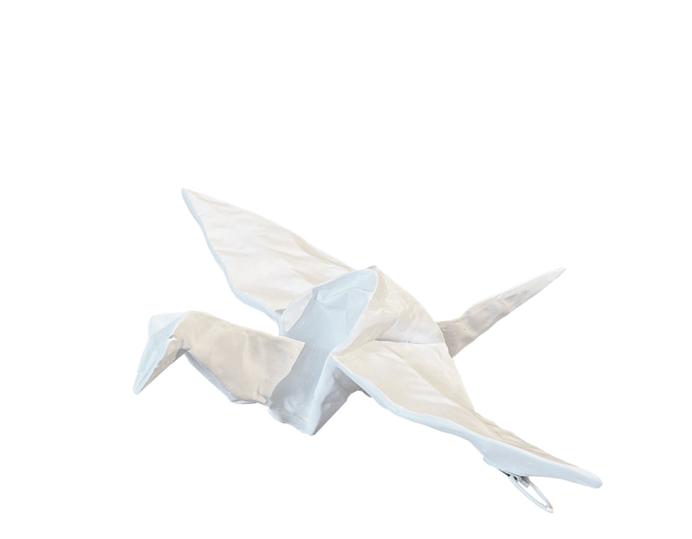 Two origami cranes on a white background