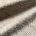 Close-up of textured fabric with concentric circular pattern