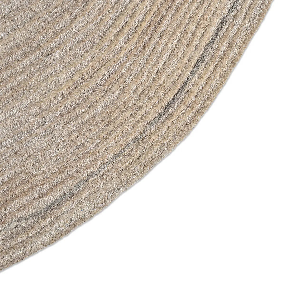 Close-up of a textured beige rug corner on a white background