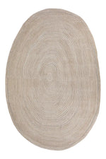 Round beige rug with concentric circle pattern on a white background