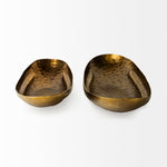 Two antique gold hammered bowls on a white background, designed to resemble oversized boat trays.