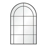 A large full-length mirror with an arched frame and grid-like iron details.