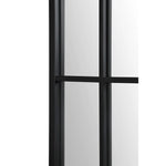 A large full-length mirror with an arched frame and grid-like iron details.