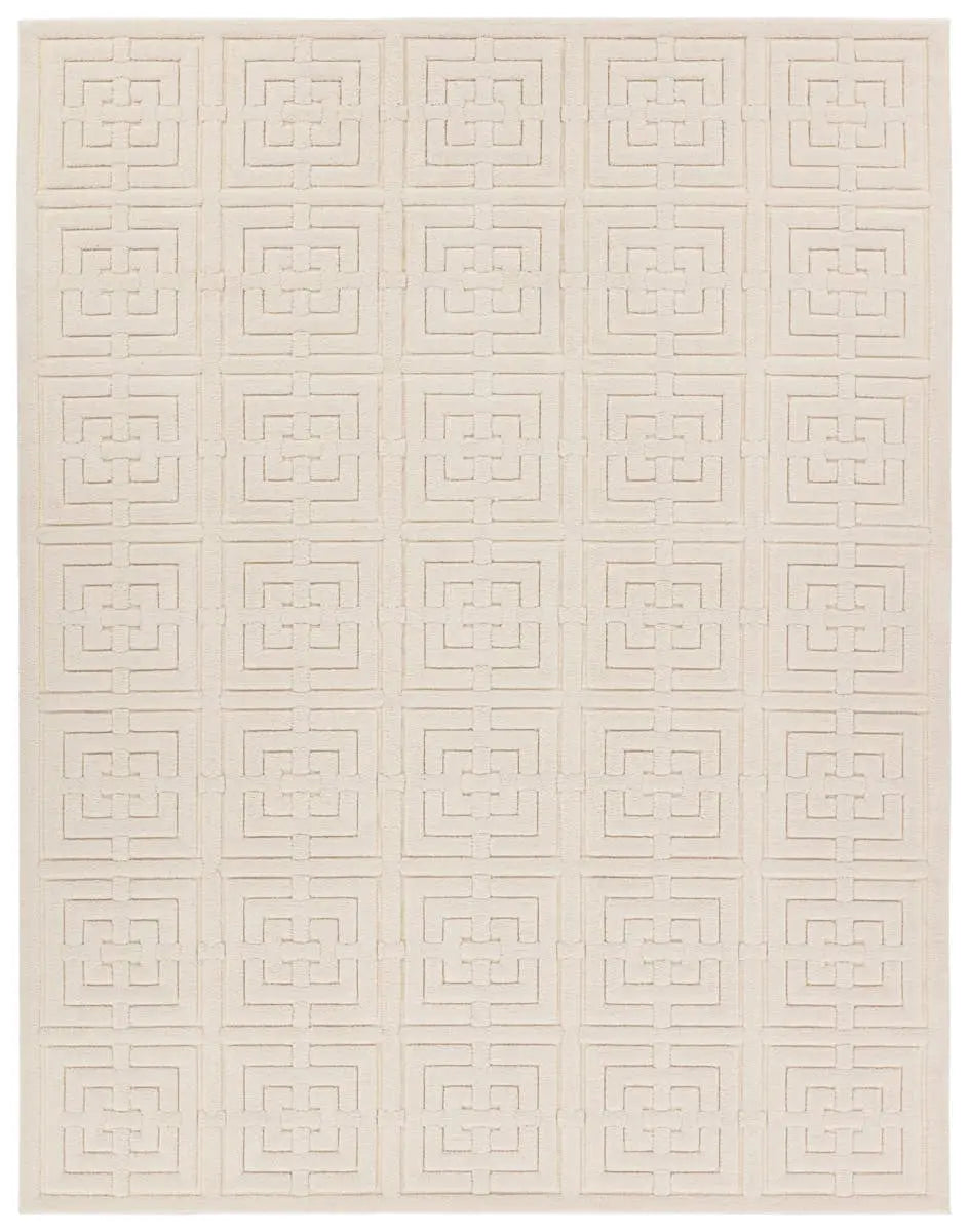 A beige area rug with a geometric pattern