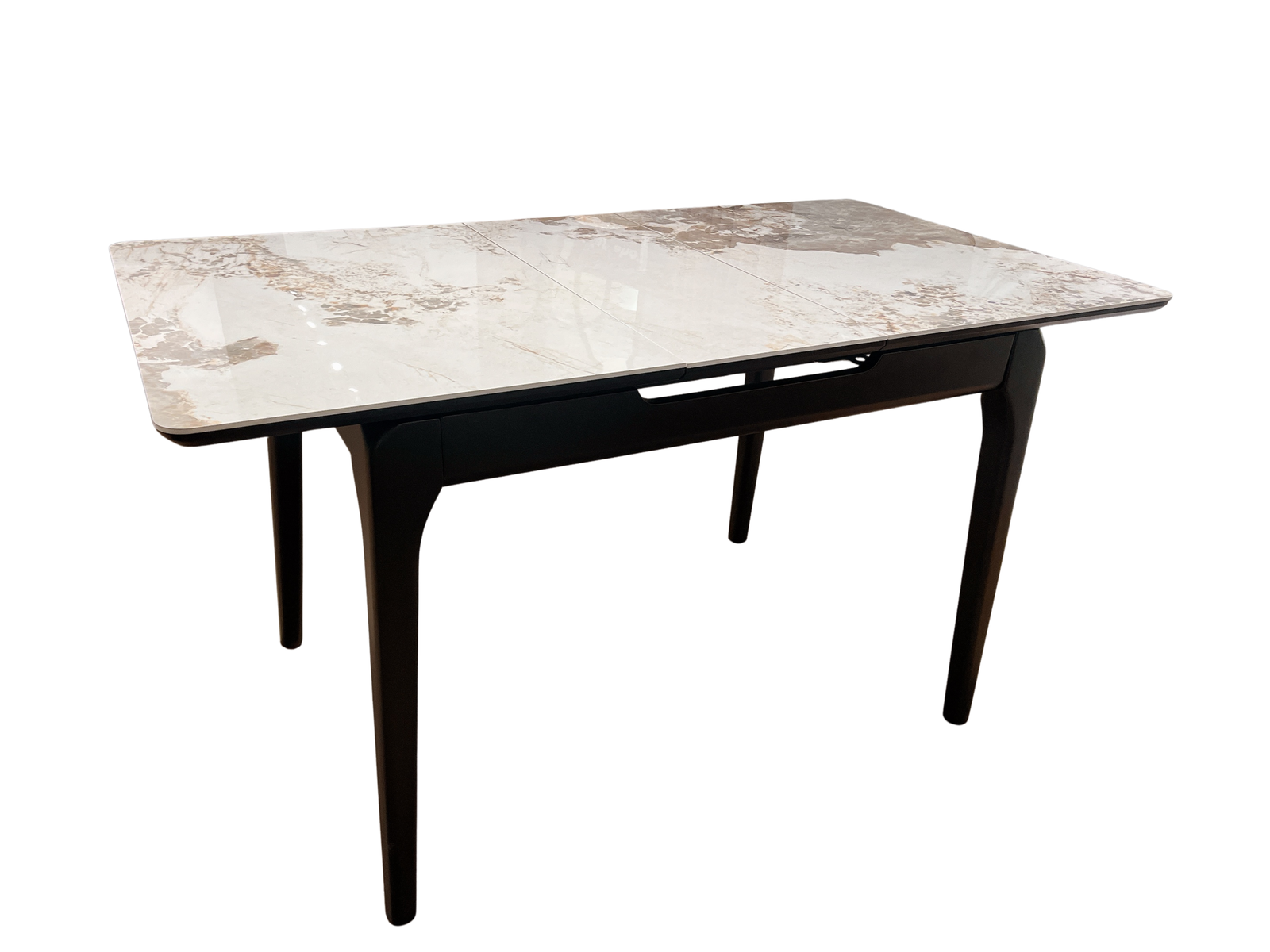 Dining table with marble-like top and black base on a white background