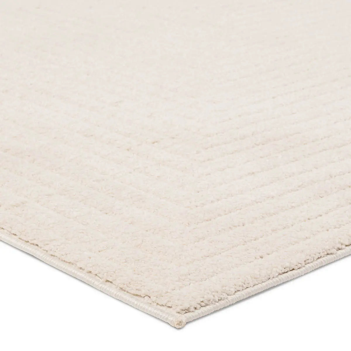 Beige rug corner on a white background