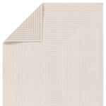 Beige rug with geometric pattern on a white background