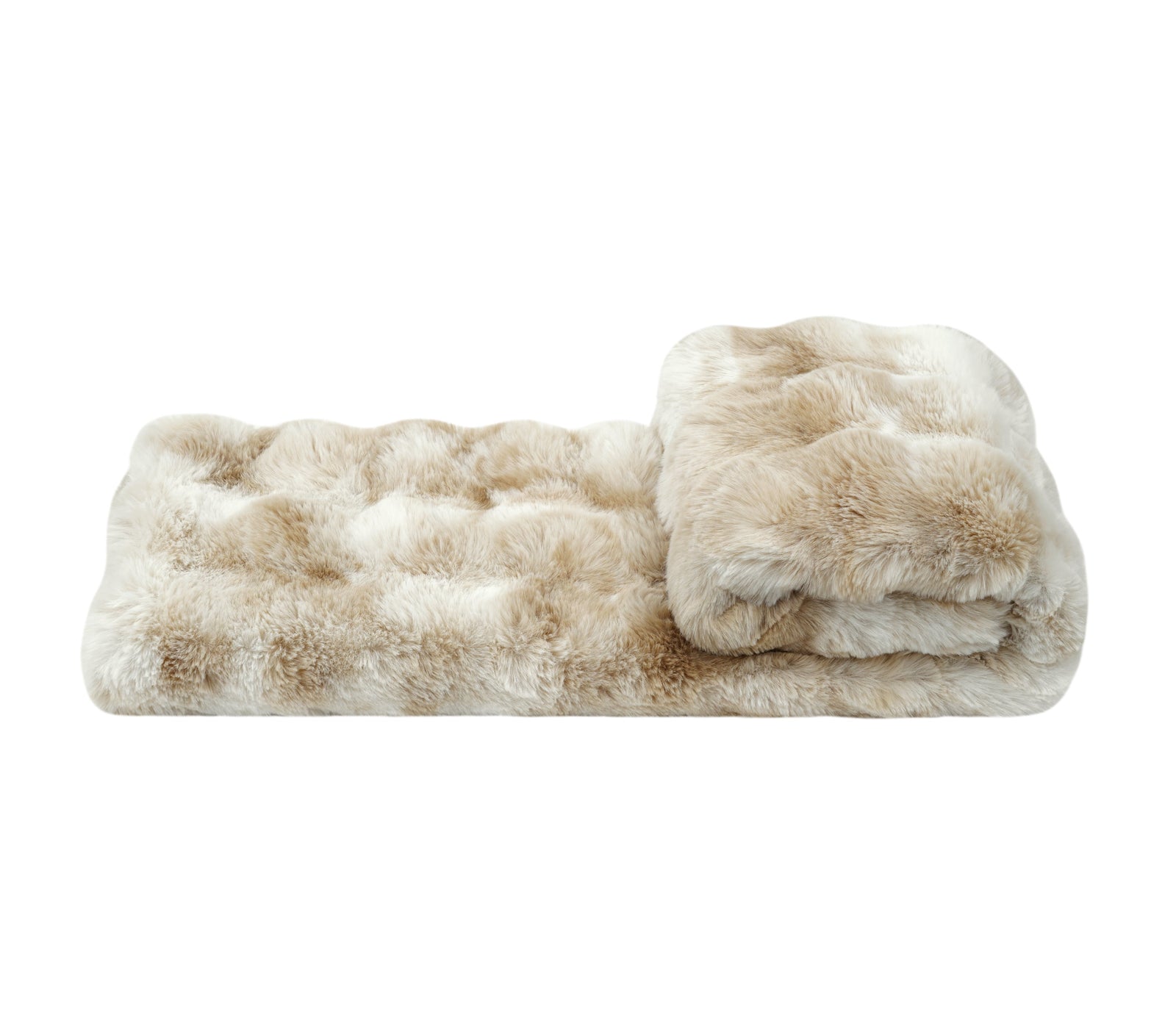 A folded faux fur blanket in a beige and cream colorway, displayed on a clean white background