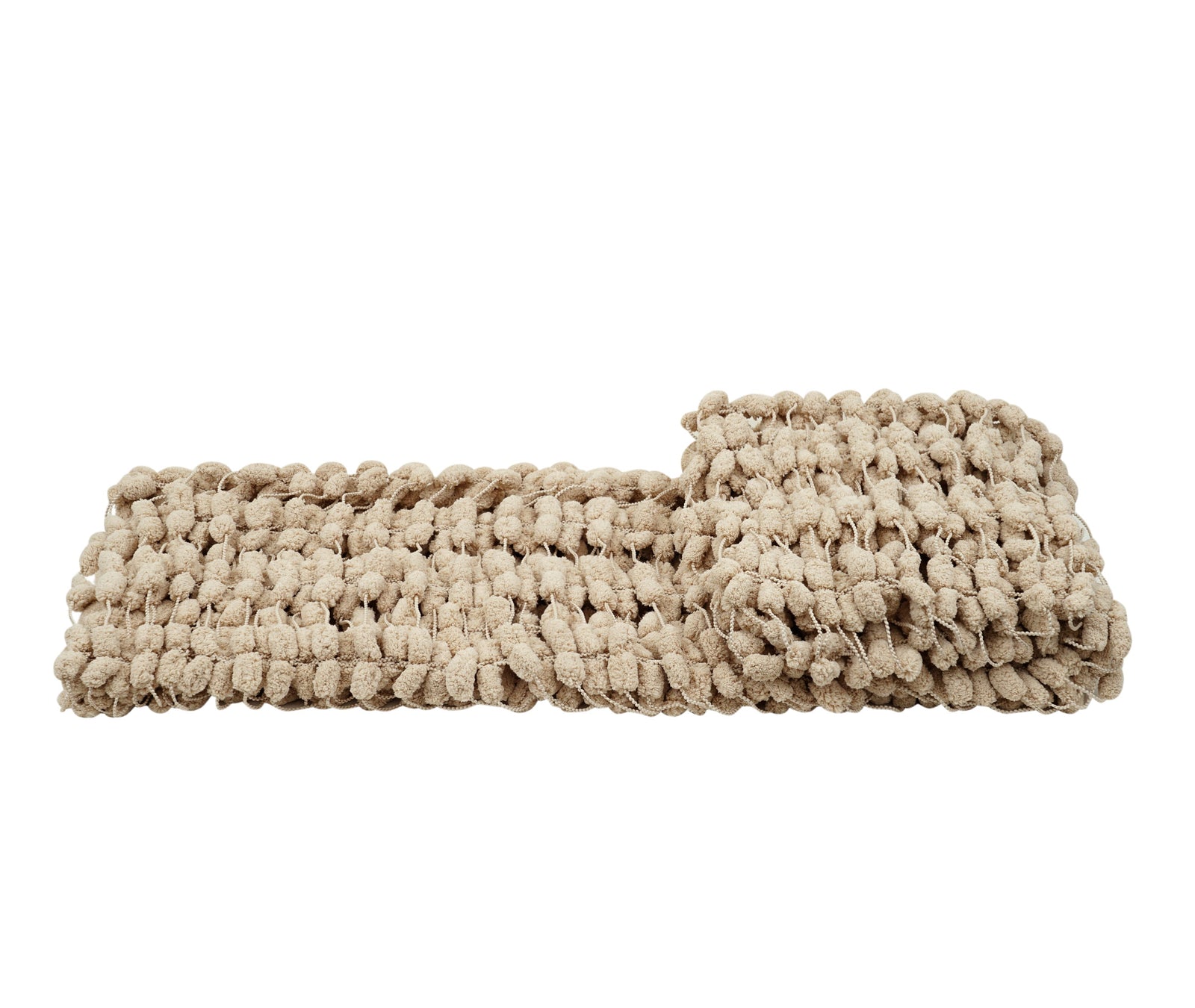 A beige textured woven rug with a chunky, looped tufted pattern, shown folded on a white background