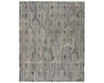 A rectangular wool area rug with a geometric pattern in gray, beige, and other colors.