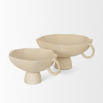 Two beige ceramic pottery decor objects with a textured finish on a white background.