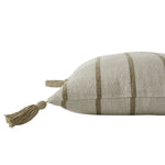 Decorative pillow with striped pattern and tassels on a white background