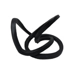 A black ribbon accent decor with an abstract, twisted shape.