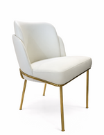 White chair with gold legs on a white background