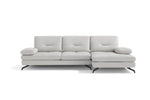 A beige upholstered sectional sofa with a chaise on the right side, featuring a contemporary design with three seat cushions and a back cushion.