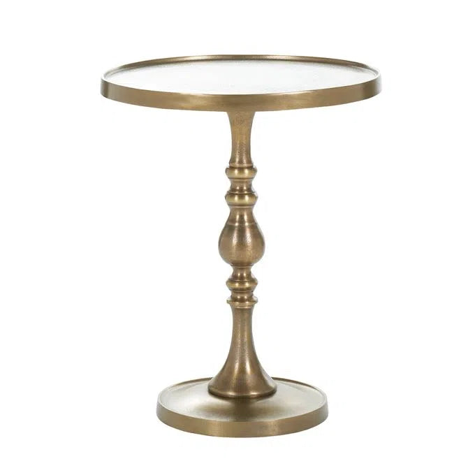 A round aluminum end table with antique brass finish, featuring a single pedestal leg.
