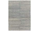 A rectangular area rug with a striped pattern in shades of blue and gray.