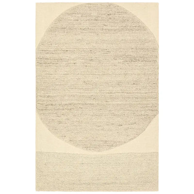 Beige area rug with a circular design on a white background