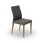 A solid oak dining chair with a gray cushioned seat and backrest, and a wooden frame.