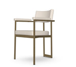 Modern chair with white cushioned seat and backrest on a white background