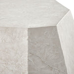 Close-up of a textured stone surface with a hexagonal pattern