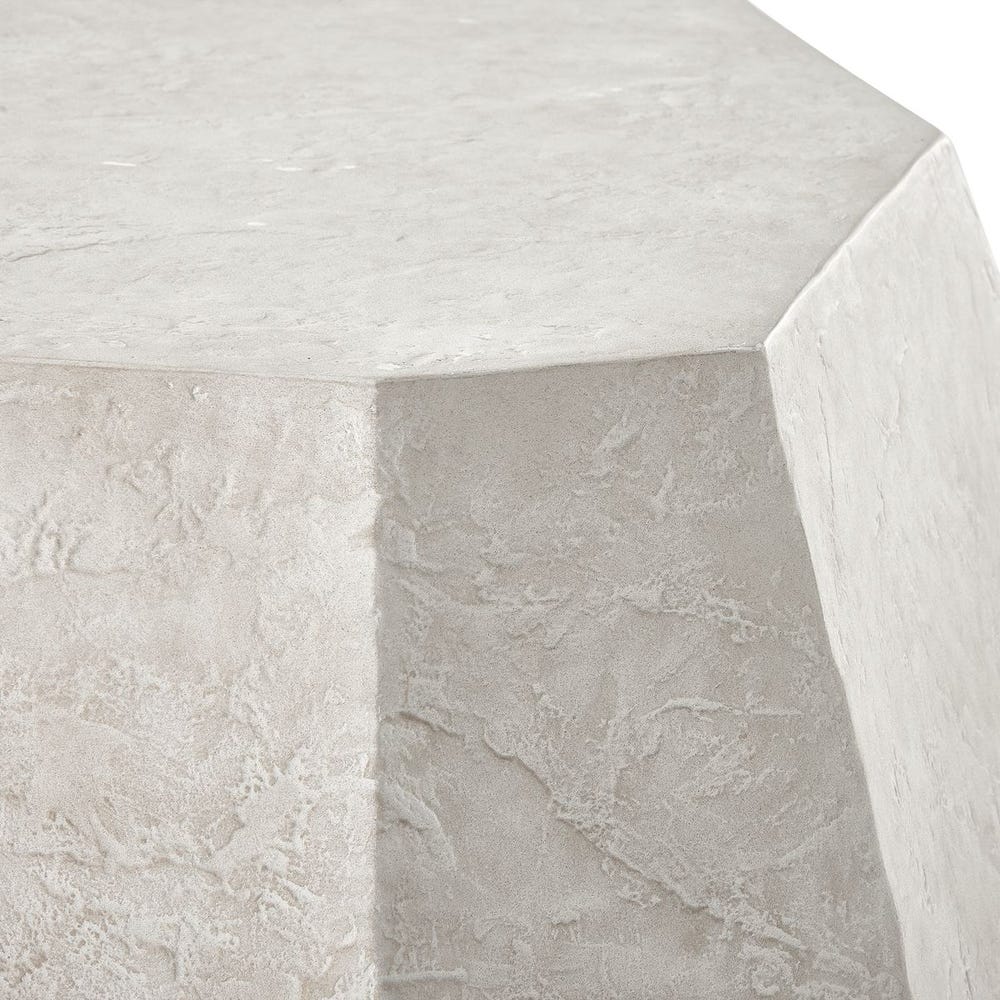 Close-up of a textured stone surface with a hexagonal pattern