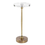 Clear glass top side table with gold metal base on a white background