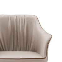 Beige leather sofa with a white background