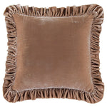 Brown velvet pillow with ruffled edges on a white background