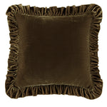 Brown velvet pillow with ruffled edges on a white background