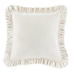 White pillow with ruffled edges on a white background