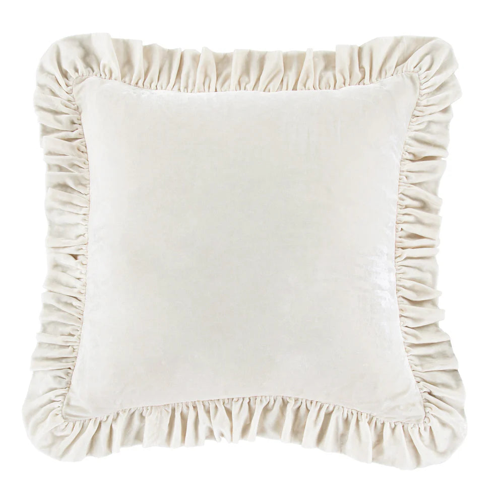 White pillow with ruffled edges on a white background