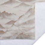 Textured paper with watercolor mountain design on a white background