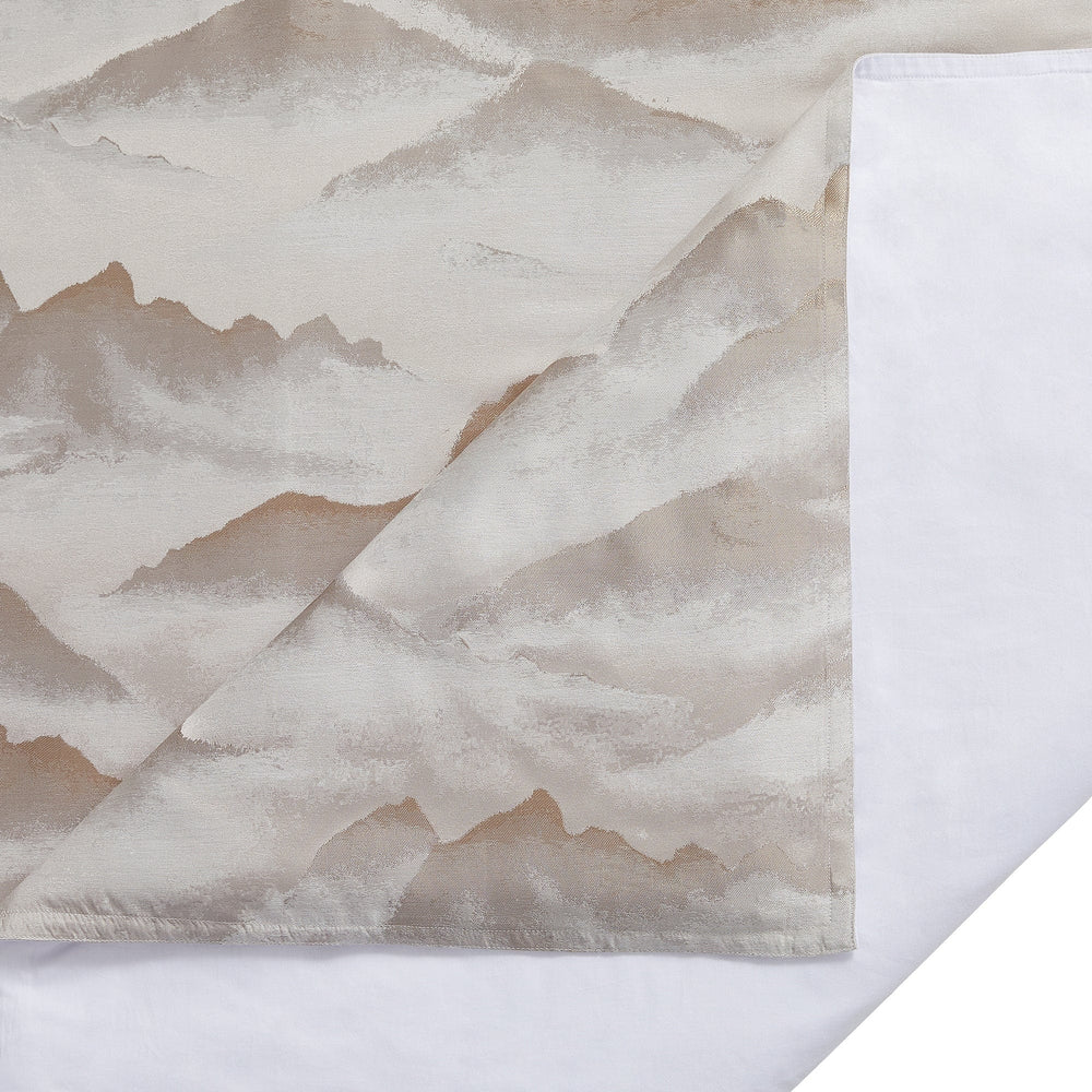 Textured paper with watercolor mountain design on a white background