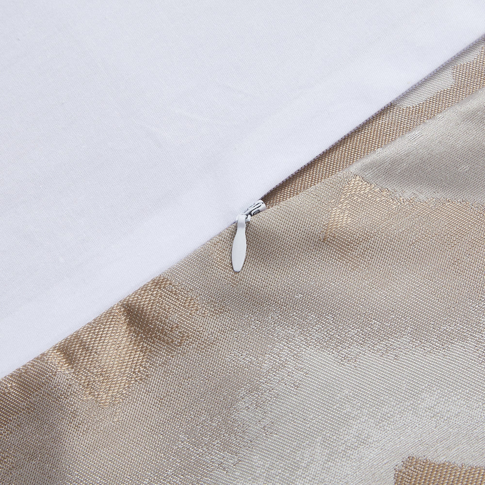 Close-up of a beige fabric with a zipper on a white background