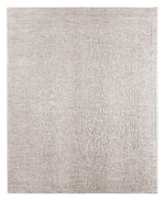 Textured gray area rug on a white background