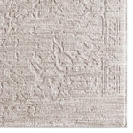 Textured beige rug with geometric pattern
