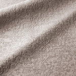 Close-up of textured stone surface with intricate patterns