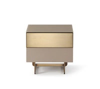 Two-toned nightstand with beige and gold finish on a white background