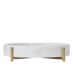 Round marble coffee table with gold legs on a white background