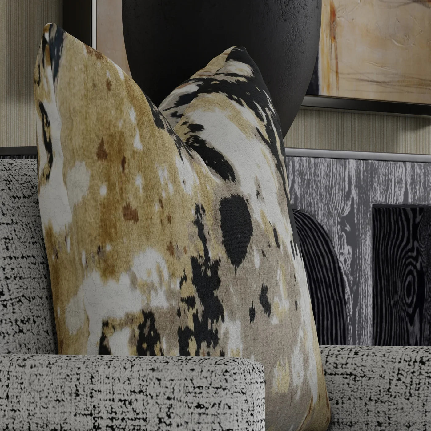 Decorative pillow with a cow print on a textured surface