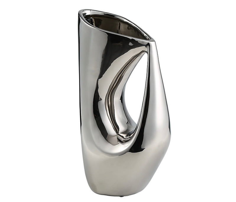 A silver porcelain vase with an abstract design.