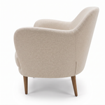 Beige armchair with wooden legs on a white background
