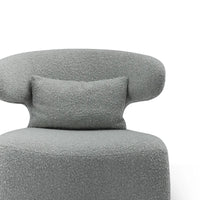 Gray textured armchair with a pillow on a white background