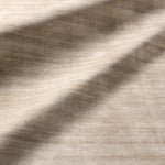 Close-up of beige fabric texture